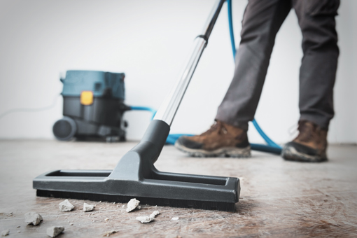 hoover cleaning up construction dust